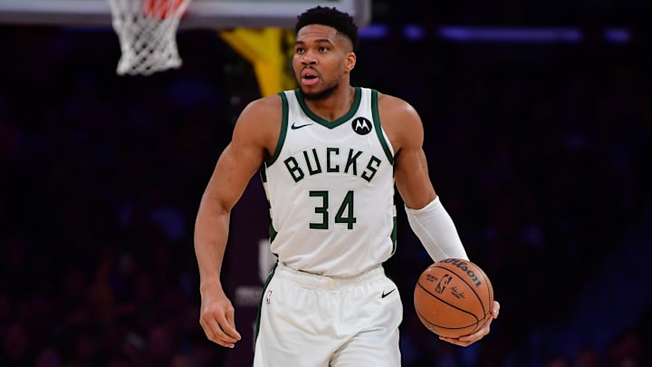 Jan 9, 2026; Los Angeles, California, USA; Milwaukee Bucks forward Giannis Antetokounmpo (34) controls the ball against the Los Angeles Lakers during the first half at Crypto.com Arena. Mandatory Credit: Gary A. Vasquez-Imagn Images