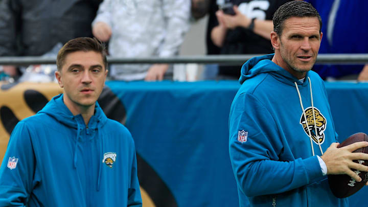 Jacksonville Jaguars general manager James Gladstone, left, and Executive Vice President of Football Operations Tony Boselli walk on the field before an NFL football game at EverBank Stadium, Sunday, Dec. 7, 2025, in Jacksonville, Fla. [Corey Perrine/Florida Times-Union]
