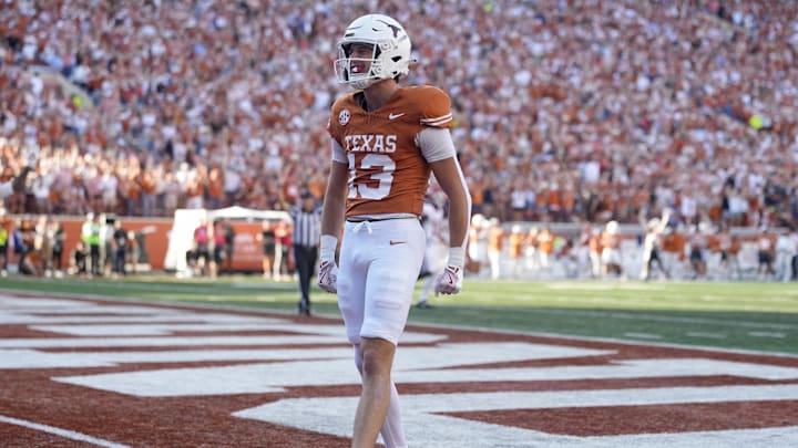 Nov 22, 2025; Austin, Texas, USA; Texas Longhorns wide receiver Parker Livingstone (13) reacts after scoring a touchdown during the first half against the Arkansas Razorbacks at Darrell K Royal-Texas Memorial Stadium. Mandatory Credit: Scott Wachter-Imagn Images Nov 22, 2025; Austin, Texas, USA; Texas Longhorns wide receiver Parker Livingstone (13) reacts after scoring a touchdown during the first half against the Arkansas Razorbacks at Darrell K Royal-Texas Memorial Stadium. Mandatory Credit: Scott Wachter-Imagn Images