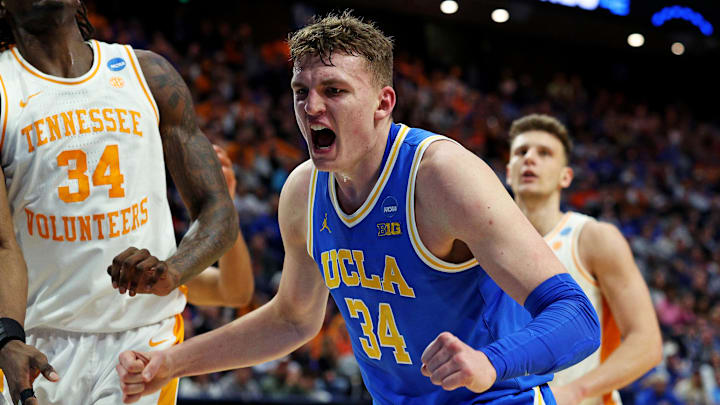 Mar 22, 2025; Lexington, KY, USA; UCLA Bruins forward Tyler Bilodeau (34) and Tennessee Volunteers forward Felix Okpara (34) react after a play during the first half in the second round of the NCAA Tournament at Rupp Arena. Mandatory Credit: Jordan Prather-Imagn Images