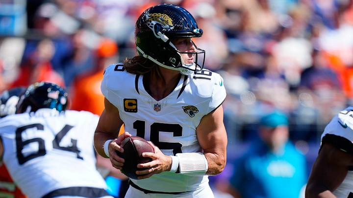 Sep 20, 2026; Denver, Colorado, USA;  Jacksonville Jaguars quarterback Trevor Lawrence (16) stands in the pocket against the Denver Broncos during the first quarter at Empower Field at Mile High.  Mandatory Credit: Ron Chenoy-Imagn Images