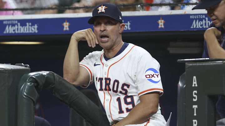 Apr 22, 2025; Houston, Texas, USA; Houston Astros manager Joe Espada (19) shouts from the dugout steps during the fifth inning against the Toronto Blue Jays at Daikin Park. Mandatory Credit: Troy Taormina-Imagn Images