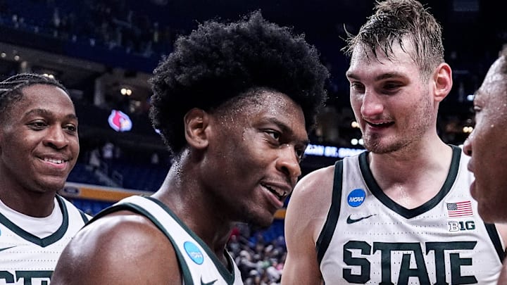Michigan State guard Trey Fort (9), center left, and guard Jeremy Fears Jr. (1) celebrates 77-69 win over Louisville at the NCAA Tournament Second Round at KeyBank Center in Buffalo on Saturday, March 21, 2026. Michigan State guard Trey Fort (9), center left, and guard Jeremy Fears Jr. (1) celebrates 77-69 win over Louisville at the NCAA Tournament Second Round at KeyBank Center in Buffalo on Saturday, March 21, 2026.