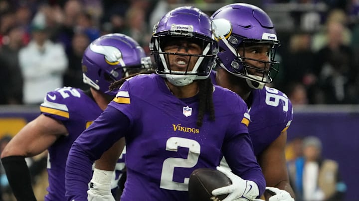 Oct 6, 2024; London, United Kingdom; Minnesota Vikings cornerback Stephon Gilmore (2) celebrates with teammates after intercepting a pass in the fourth quarter against the New York Jets at Tottenham Hotspur Stadium. Mandatory Credit: Kirby Lee-Imagn Images