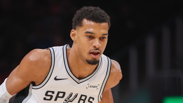 Dec 19, 2025; Atlanta, Georgia, USA; San Antonio Spurs forward Victor Wembanyama (1) dribbles against the Atlanta Hawks in the first quarter at State Farm Arena. Mandatory Credit: Brett Davis-Imagn Images
