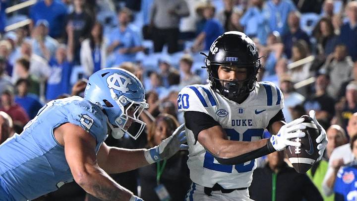 Nov 22, 2025; Chapel Hill, North Carolina, USA; Duke Blue Devils running back Nate Sheppard (20) scores during the second half at Kenan Stadium. Mandatory Credit: William Howard-Imagn Images