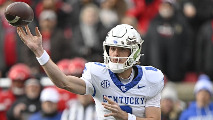 Nov 29, 2025; Louisville, Kentucky, USA;  Kentucky Wildcats quarterback Cutter Boley (8) passes the ball against the Louisville Cardinals during the first quarter at L&N Federal Credit Union Stadium. Mandatory Credit: Jamie Rhodes-Imagn Images