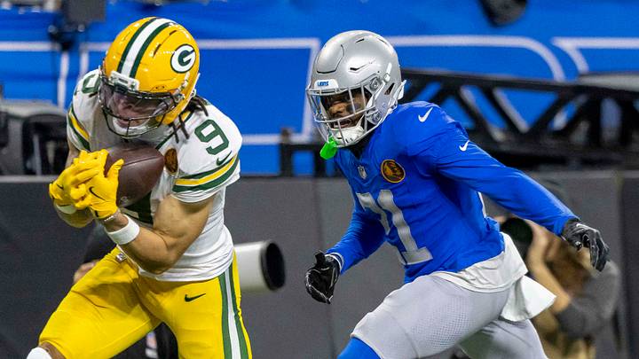 Green Bay Packers wide receiver Christian Watson (9) catches a pass against former Lions cornerback Amik Robertson (21) Green Bay Packers wide receiver Christian Watson (9) catches a pass against former Lions cornerback Amik Robertson (21)