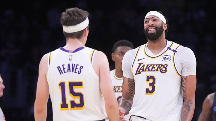 Dec 15, 2024; Los Angeles, California, USA; Los Angeles Lakers forward Anthony Davis (3) and guard Austin Reaves (15) react in the first hqlf against the Memphis Grizzlies at Crypto.com Arena. Mandatory Credit: Kirby Lee-Imagn Images
