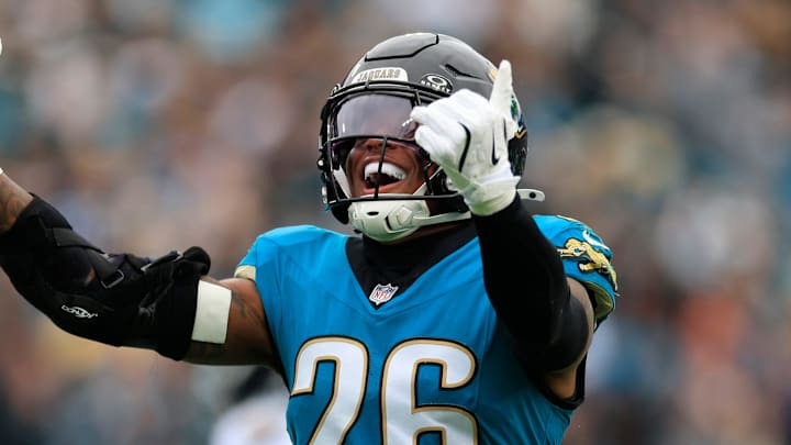 Jacksonville Jaguars safety Antonio Johnson (26) reacts to his tackle during the first quarter of an NFL football matchup at EverBank Stadium, Sunday, Jan. 4, 2026, in Jacksonville, Fla. The Jaguars defeated the Titans 41-7, capturing the AFC South title. 