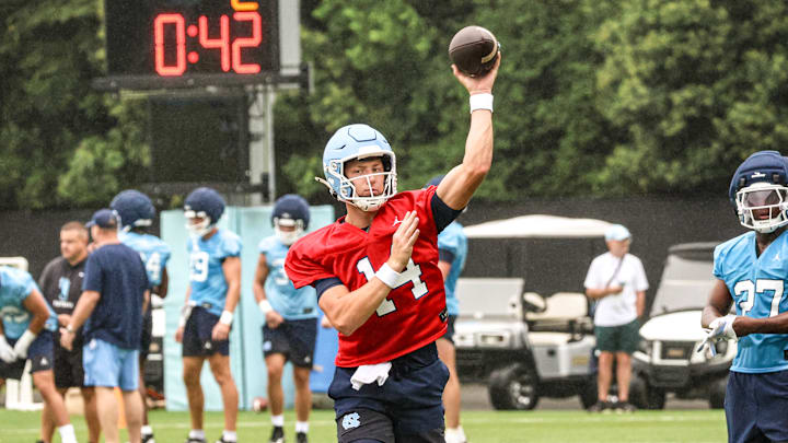 North Carolina Max Johnson throwing a pass at practice at the Koman Practice Complex on Saurday, Aug. 2.
