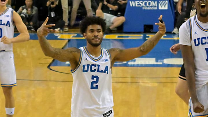 Jan 20, 2026; Los Angeles, California, USA; UCLA Bruins guard Eric Dailey Jr. (3), guard Trent Perry (0), guard Donovan Dent (2) and forward Xavier Booker (1) celebrate after a 3-point basket by forward Tyler Bilodeau (34) in the final seconds of the game against the Purdue Boilermakers in the second half at Pauley Pavilion presented by Wescom Financial. Mandatory Credit: Jayne Kamin-Oncea-Imagn Images