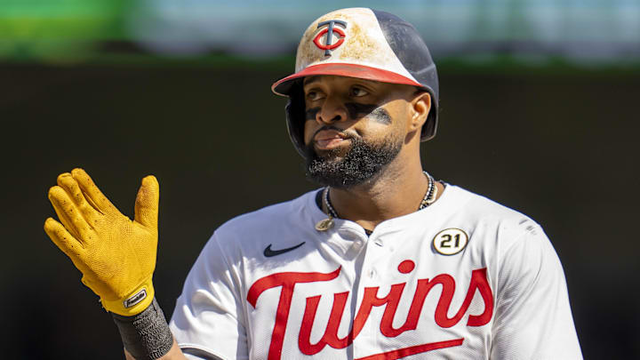 Sep 15, 2024; Minneapolis, Minnesota, USA; Minnesota Twins first baseman Carlos Santana (21) celebrates after hitting a single against the Cincinnati Reds in the fourth inning at Target Field Sep 15, 2024; Minneapolis, Minnesota, USA; Minnesota Twins first baseman Carlos Santana (21) celebrates after hitting a single against the Cincinnati Reds in the fourth inning at Target Field
