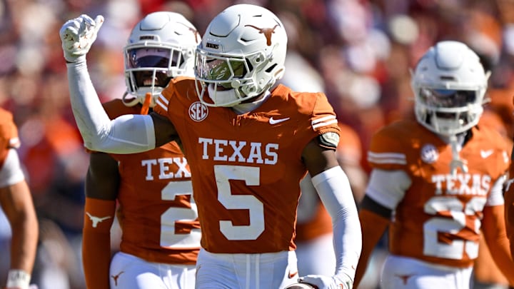 Texas Longhorns CB Malik Muhammad celebrates after an interception during the game against the Oklahoma Sooners.