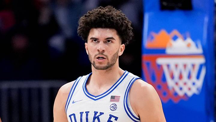 Mar 14, 2026; Charlotte, NC, USA; Duke Blue Devils forward Cameron Boozer (12) celebrates after a play against the Virginia Cavaliers during the men's ACC Conference Tournament Championship at Spectrum Center. Mandatory Credit: Jim Dedmon-Imagn Images