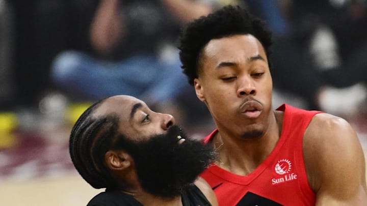 Cleveland Cavaliers guard James Harden drives to the basket against Toronto Raptors forward Scottie Barnes.