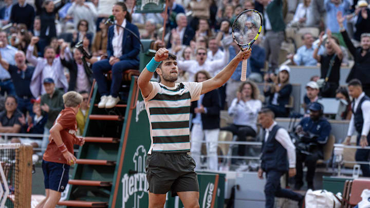 Alcaraz reacts to a point during the men’s singles final against Sinner on day 15 at Roland Garros Stadium. 