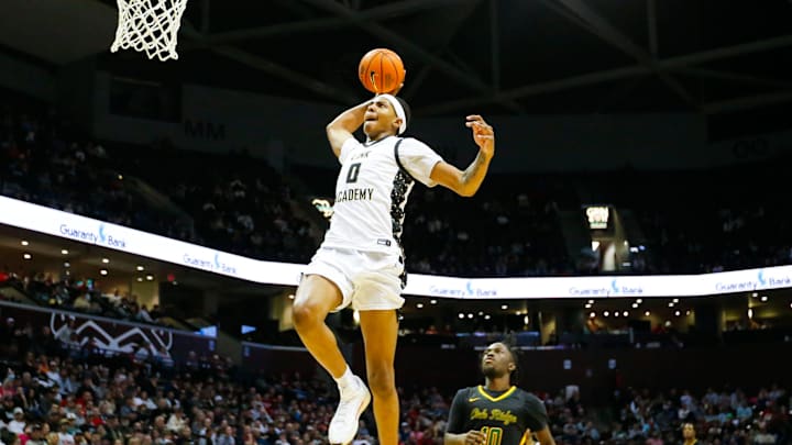 Link Academy's Chris Cenac Jr. dunks the ball as the Lions took on Oak Ridge Pioneers in the championship game of the Bass Pro Tournament of Champions at Great Southern Bank Arena on Saturday, Jan. 18, 2025.