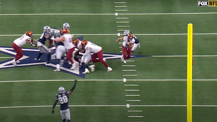 Marcus Mariota takes off on fourth and one late in the fourth quarter against the Cowboys.