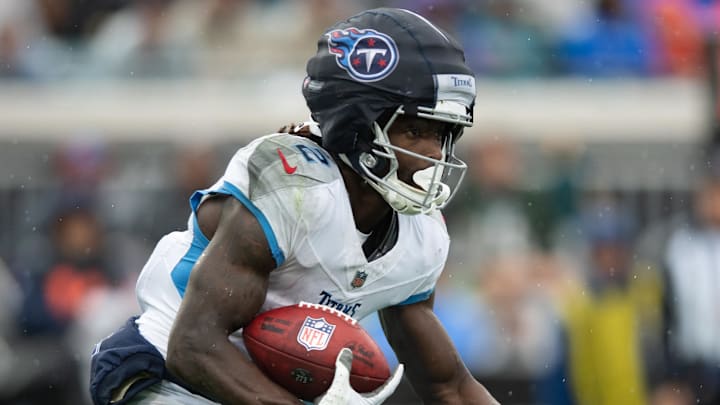 Dec 29, 2024; Jacksonville, Florida, USA; Tennessee Titans running back Tyjae Spears (2) runs the ball against the Jacksonville Jaguars in the first quarter at EverBank Stadium. Mandatory Credit: Jeremy Reper-Imagn Images Dec 29, 2024; Jacksonville, Florida, USA; Tennessee Titans running back Tyjae Spears (2) runs the ball against the Jacksonville Jaguars in the first quarter at EverBank Stadium. Mandatory Credit: Jeremy Reper-Imagn Images