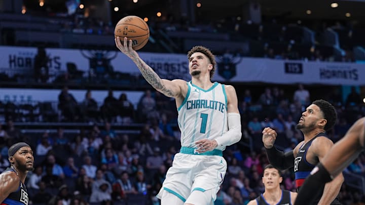Nov 6, 2024; Charlotte, North Carolina, USA; Charlotte Hornets guard LaMelo Ball (1) goes up for a shot against the Detroit Pistons during the second half at Spectrum Center. Mandatory Credit: Jim Dedmon-Imagn Images
