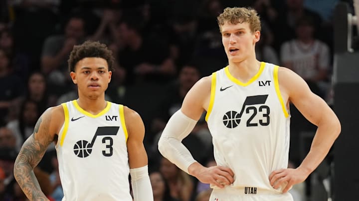 Feb 7, 2025; Phoenix, Arizona, USA; Utah Jazz guard Keyonte George (3) and Utah Jazz forward Lauri Markkanen (23) look on against the Phoenix Suns during the first half at Footprint Center. Mandatory Credit: Joe Camporeale-Imagn Images