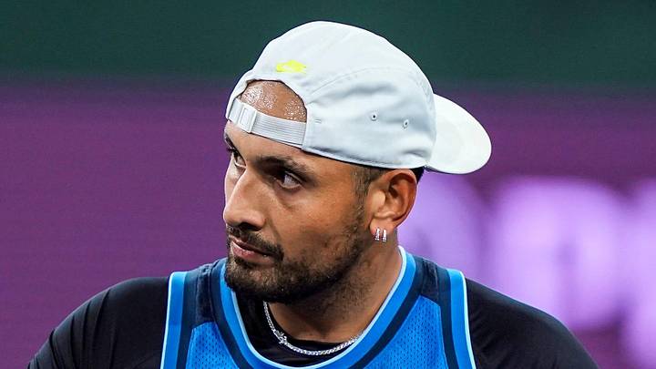 Nick Kyrgios celebrates reaching set point in a tiebreaker