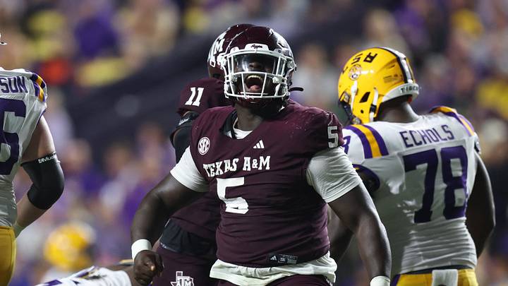 Oct 25, 2025; Baton Rouge, Louisiana, USA; Texas A&M Aggies defensive tackle DJ Hicks (5) celebrates after a play during the second half against the Louisiana State Tigers at Tiger Stadium. Mandatory Credit: Stephen Lew-Imagn Images