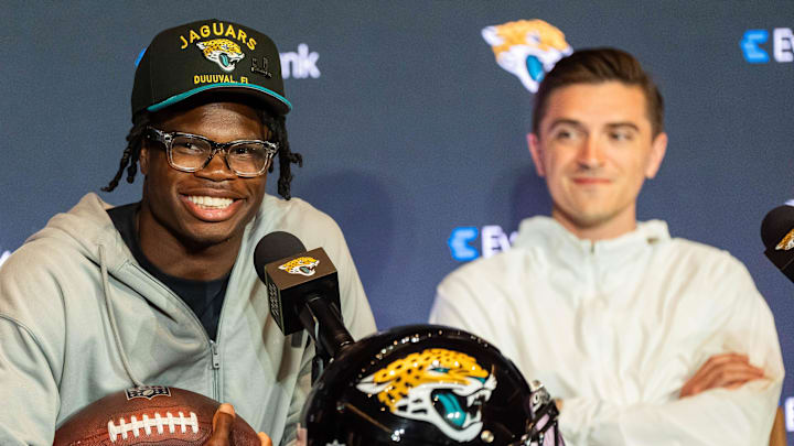 The Jacksonville Jaguars’ first-round pick, Colorado Buffaloes wide receiver and defensive back Travis Hunter, left, answers questions during a press conference Friday, March 25, 2025, at Miller Electric Center in Jacksonville, Fla., with General Manager James Gladstone, right. [Doug Engle/Florida Times-Union]