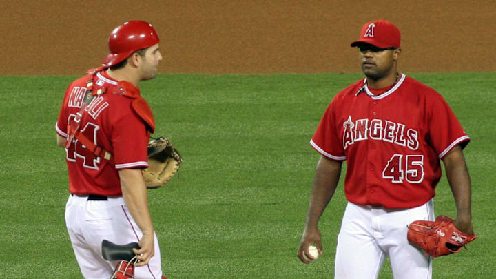 Angels catcher Mike Napoli (44) speaks with pitcher Kelvim Escobar (45) in the seventh inning at Angel Stadium in Anaheim. Angels catcher Mike Napoli (44) speaks with pitcher Kelvim Escobar (45) in the seventh inning at Angel Stadium in Anaheim.