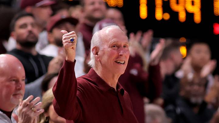 Former Texas A&M Aggies football coach R.C. Slocum acknowledges the fans during a timeout against the Alabama Crimson Tide during the first half at Reed Arena.