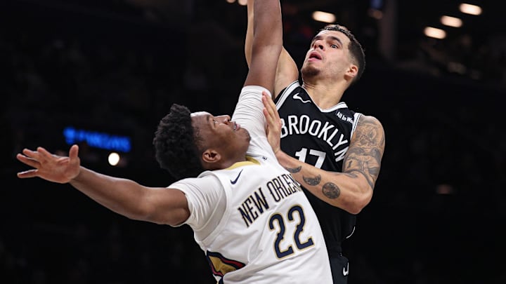 Dec 6, 2025; Brooklyn, New York, USA; Brooklyn Nets forward Michael Porter Jr. (17) goes to the basket againstNew Orleans Pelicans center Derik Queen (22) during the second half at Barclays Center. Mandatory Credit: Vincent Carchietta-Imagn Images