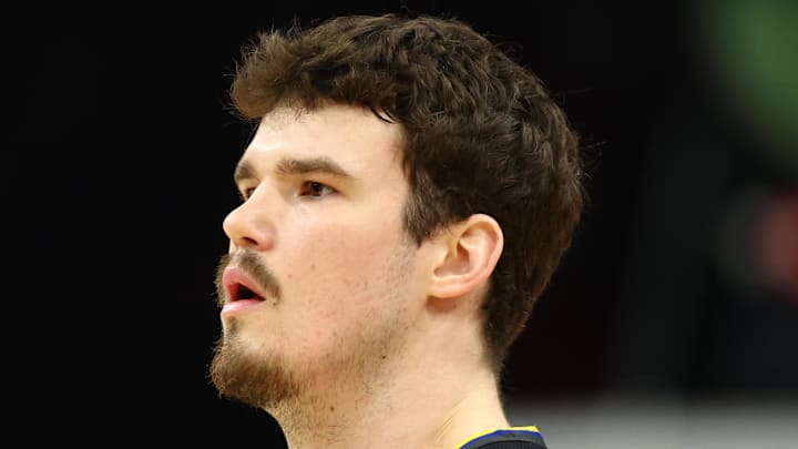 Feb 5, 2026; Phoenix, Arizona, USA; Golden State Warriors center Quinten Post (21) against the Phoenix Suns at Mortgage Matchup Center. Mandatory Credit: Mark J. Rebilas-Imagn Images