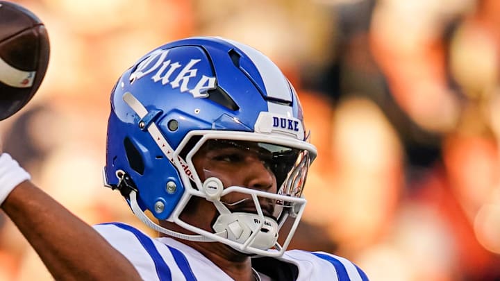 Nov 8, 2025; East Hartford, Connecticut, USA; Duke Blue Devils quarterback Darian Mensah (10) throws a pass against the UConn Huskies in the first quarter at Pratt & Whitney Stadium at Rentschler Field. Mandatory Credit: David Butler II-Imagn Images