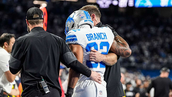 Detroit Lions safety Brian Branch (32) with help of Lions staff, walk off the field due to an injury against Cowboys Detroit Lions safety Brian Branch (32) with help of Lions staff, walk off the field due to an injury against Cowboys