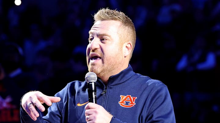Dec 3, 2025; Auburn, Alabama, USA; Auburn Tigers head football coach Alex Golesh is introduced during the first half of a basketball game between the Auburn Tigers and NC State Wolfpack at Neville Arena. Mandatory Credit: John Reed-Imagn Images