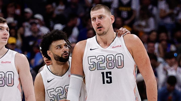 May 15, 2025; Denver, Colorado, USA; Denver Nuggets guard Jamal Murray (27) and center Nikola Jokic (15) and guard Christian Braun (0) in the fourth quarter against the Oklahoma City Thunder during game six of the second round for the 2025 NBA Playoffs at Ball Arena.