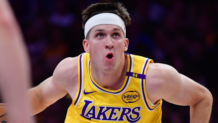 Apr 30, 2025; Los Angeles, California, USA; Los Angeles Lakers guard Austin Reaves (15) moves to the basket against the Minnesota Timberwolves during the first half in game five of first round for the 2025 NBA Playoffs at Crypto.com Arena. Mandatory Credit: Gary A. Vasquez-Imagn Images