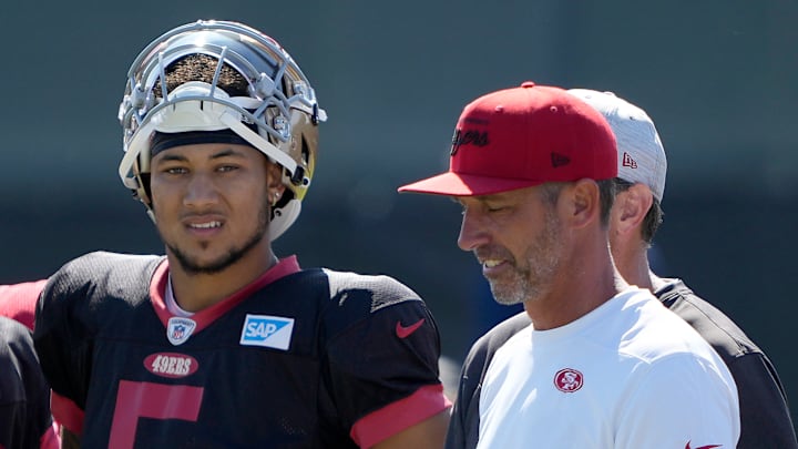 San Francisco 49ers quarterback Trey Lance (L) and head coach Kyle Shanahan (R)