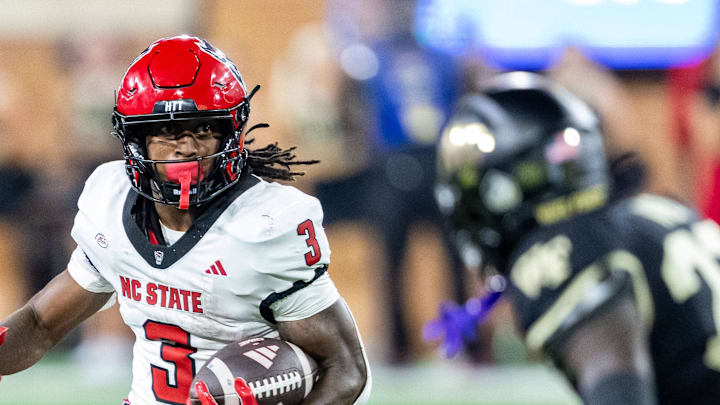 Sep 11, 2025; Winston-Salem, North Carolina, USA; North Carolina State Wolfpack running back Hollywood Smothers (3) runs the ball in the first half against the Wake Forest Demon Deacons at Allegacy Federal Credit Union Stadium. Mandatory Credit: Luke Jamroz-Imagn Images Sep 11, 2025; Winston-Salem, North Carolina, USA; North Carolina State Wolfpack running back Hollywood Smothers (3) runs the ball in the first half against the Wake Forest Demon Deacons at Allegacy Federal Credit Union Stadium. Mandatory Credit: Luke Jamroz-Imagn Images