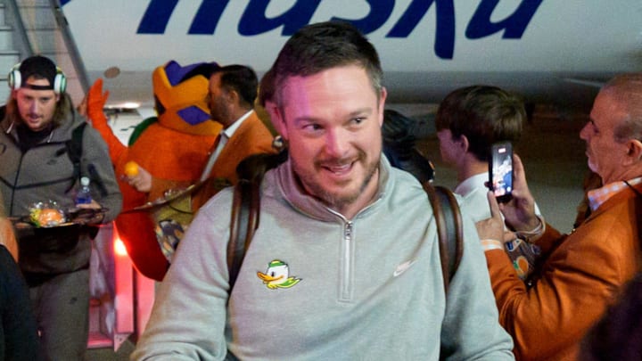 Oregon head coach Dan Lanning walks off the plane as the Oregon Ducks arrive at Miami International Airport ahead of the Orange Bowl on Dec. 29, 2025, in Miami, Florida.