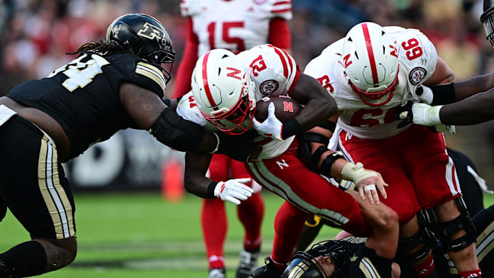 Sep 28, 2024; West Lafayette, Indiana, USA; Nebraska's Emmett Johnson gains some tough yards during the second half against Purdue.