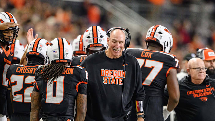 Oct 18, 2025; Corvallis, Oregon, USA; Oregon State Beavers interim head coach Robb Akey greets running back Anthony Hankerson (0) after a score during the third quarter against the Lafayette Leopards at Reser Stadium. Mandatory Credit: Craig Strobeck-Imagn Images