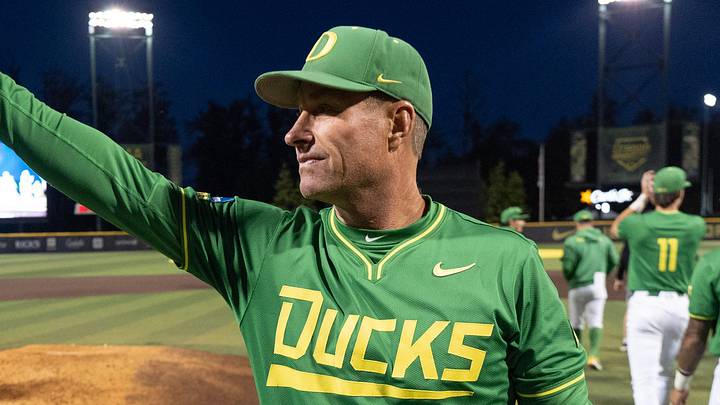 Oregon head baseball coach Mark Wasikowski gives a thumbs up to the stands after the Ducks defeated Oregon State on day three at the NCAA Eugene Regional Tournament at PK Park in Eugene May 31, 2026.