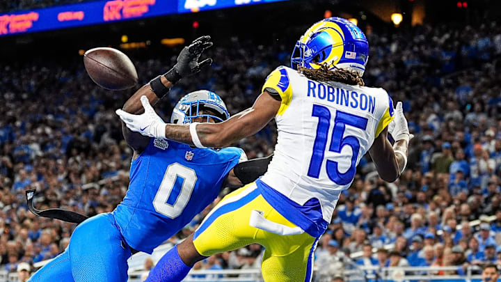 Detroit Lions CB Terrion Arnold (0) tries to block a pass intended for former Rams WR Demarcus Robinson (15). Detroit Lions CB Terrion Arnold (0) tries to block a pass intended for former Rams WR Demarcus Robinson (15).