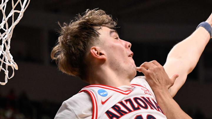 Mar 28, 2026; San Jose, CA, USA; Purdue Boilermakers forward Trey Kaufman-Renn (4) shoots the ball defended by Arizona Wildcats center Motiejus Krivas (13) in the second half during an Elite Eight game of the West Regional of the men's 2026 NCAA Tournament at SAP Center. Mandatory Credit: Eakin Howard-Imagn Images