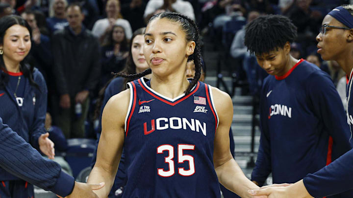 Feb 4, 2026; Chicago, Illinois, USA; UConn Huskies guard Azzi Fudd (35) is introduced before an NCAA game against the DePaul Blue Demons at Wintrust Arena. Mandatory Credit: Kamil Krzaczynski-Imagn Images