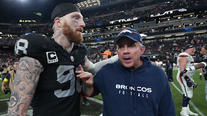 Dec 7, 2025; Paradise, Nevada, USA;  Las Vegas Raiders defensive end Maxx Crosby (98) and Denver Broncos head coach Sean Payton meet on the field following a game at Allegiant Stadium. Mandatory Credit: Kirby Lee-Imagn Images