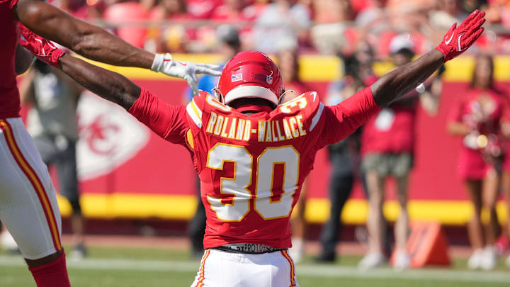 Aug 17, 2024; Kansas City, Missouri, USA; Kansas City Chiefs cornerback Christian Roland-Wallace (30) celebrates after breaking up a pass against the Detroit Lions during the first half at GEHA Field at Arrowhead Stadium. Mandatory Credit: Denny Medley-Imagn Images
