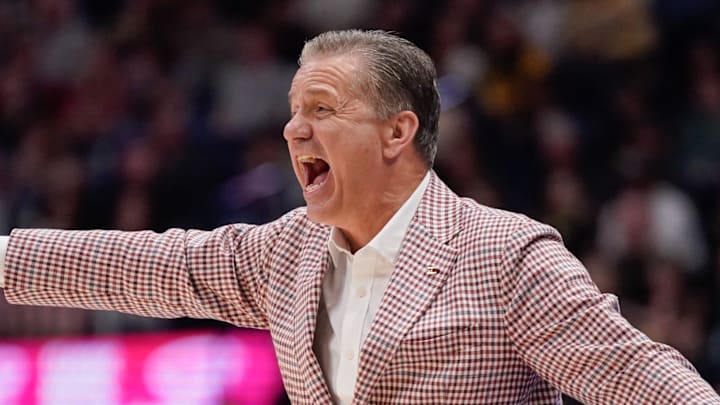 Arkansas coach John Calipari directs his team during the second half of the SEC tournament championship game against Vanderbilt at Bridgestone Arena in Nashville, Tenn., Sunday,